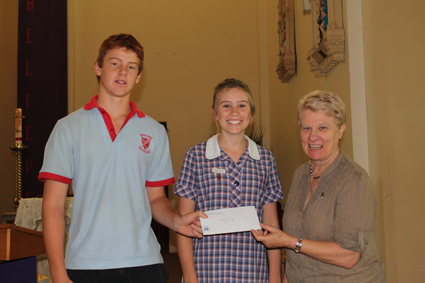 Ailsa Mackinnon with Mitchell Trinder and Suzie Alderman, school captains at Sacred Heart Central.